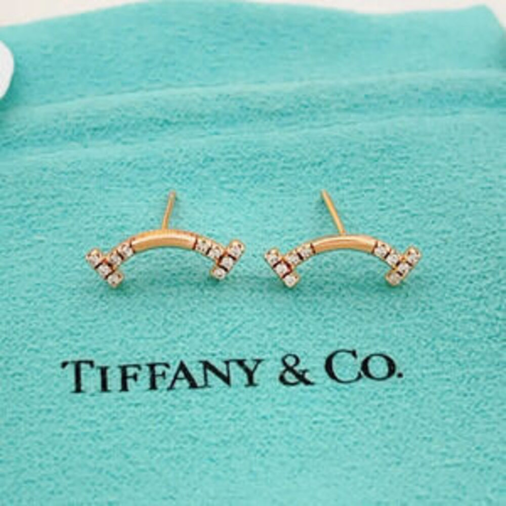 Tiffany & Co. rose gold diamond smiley face earrings